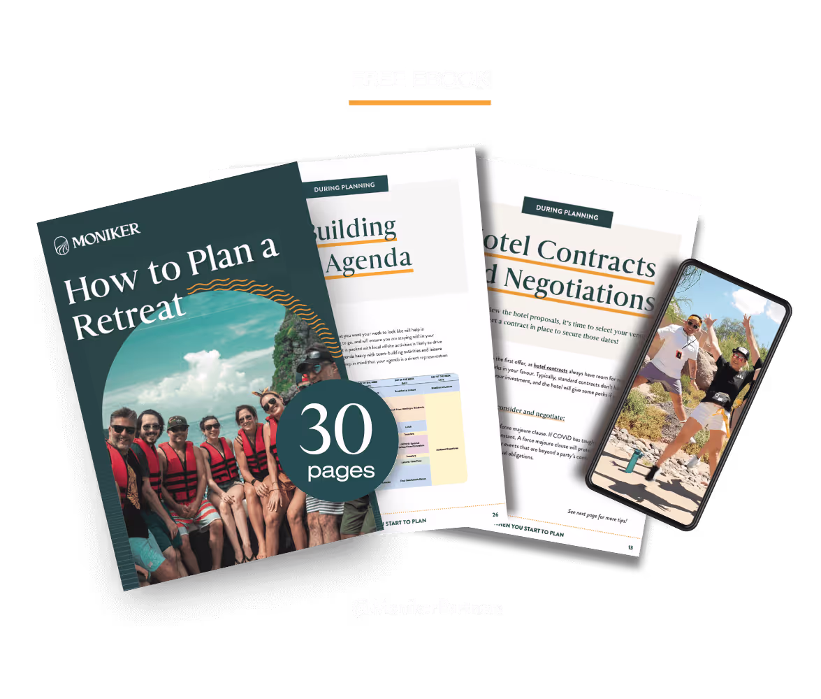 Moniker retreat planning guide with group photo and documents